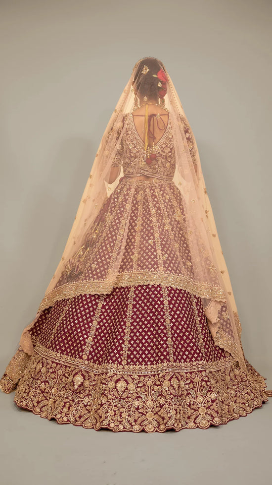 Load image into Gallery viewer, Wine raw silk traditional lehenga choli with hand embroidery
